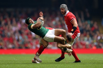 190823 - Wales v South Africa - Vodafone Summer Series - Cheslin Kolbe of South Africa is tackled by Tom Rogers of Wales 