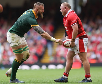 190823 - Wales v South Africa, Summer Nations Series 2023 - RG Snyman of South Africa and Keiron Assiratti of Wales share a joke during the match