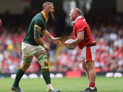 190823 - Wales v South Africa, Summer Nations Series 2023 - RG Snyman of South Africa and Keiron Assiratti of Wales share a joke during the match