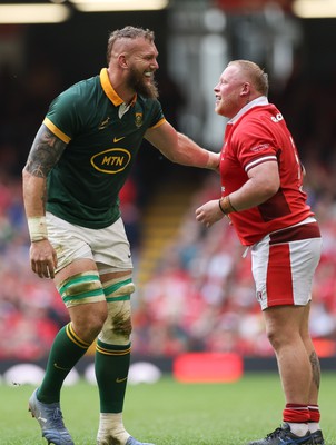 190823 - Wales v South Africa, Summer Nations Series 2023 - RG Snyman of South Africa and Keiron Assiratti of Wales share a joke during the match