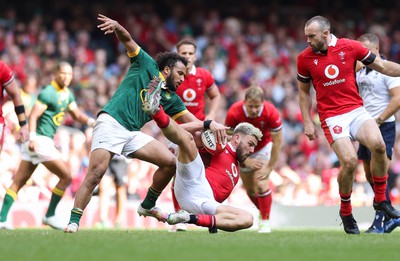 190823 - Wales v South Africa, Summer Nations Series 2023 - Johnny Williams of Wales is tackled by Jaden Hendrikse of South Africa