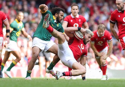 190823 - Wales v South Africa, Summer Nations Series 2023 - Johnny Williams of Wales is tackled by Jaden Hendrikse of South Africa