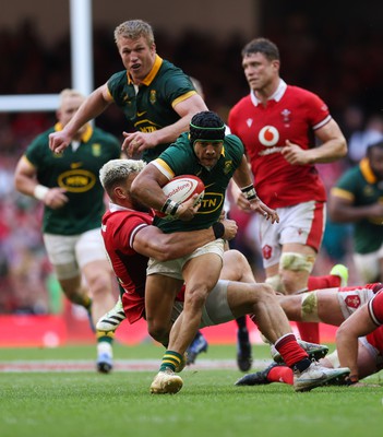 190823 - Wales v South Africa, Summer Nations Series 2023 - Cheslin Kolbe of South Africa is tackled by Johnny Williams of Wales