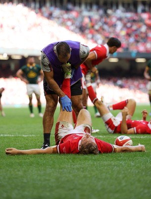 190823 - Wales v South Africa, Summer Nations Series 2023 - Sam Costelow of Wales is treated for cramp