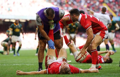 190823 - Wales v South Africa, Summer Nations Series 2023 - Sam Costelow of Wales is treated for cramp