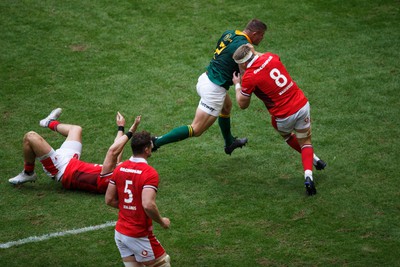 190823 - Wales v South Africa - Summer Series - Aaron Wainwright of Wales tackles Malcolm Marx of South Africa