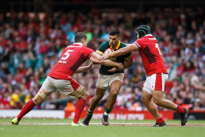 190823 - Wales v South Africa - Summer Series - Jesse Kriel of South Africa is tackled by Will Rowlands and Nicky Smith of Wales