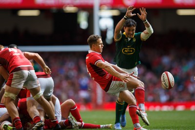 190823 - Wales v South Africa - Summer Series - Kieran Hardy of Wales kicks the ball