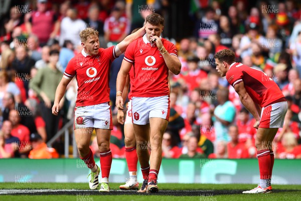 190823 - Wales v South Africa - Vodaphone Summer Series - Sam Costelow of Wales consoles Mason Grady of Wales