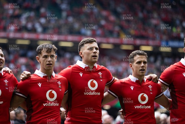 190823 - Wales v South Africa - Vodafone Summer Series - Tom Rogers, Mason Grady and Kieran Hardy of Wales sing the anthem