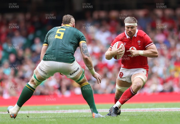 190823 - Wales v South Africa, Summer Nations Series 2023 - Aaron Wainwright of Wales is tackled by RG Snyman of South Africa