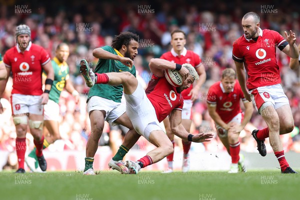 190823 - Wales v South Africa, Summer Nations Series 2023 - Johnny Williams of Wales is tackled by Jaden Hendrikse of South Africa