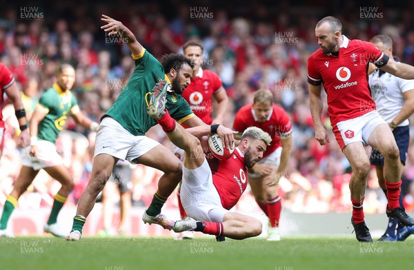 190823 - Wales v South Africa, Summer Nations Series 2023 - Johnny Williams of Wales is tackled by Jaden Hendrikse of South Africa