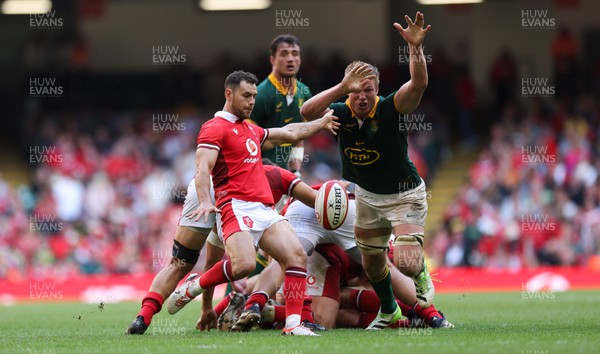 190823 - Wales v South Africa, Summer Nations Series 2023 - Pieter-Steph du Toit of South Africa closes in on Tomos Williams of Wales