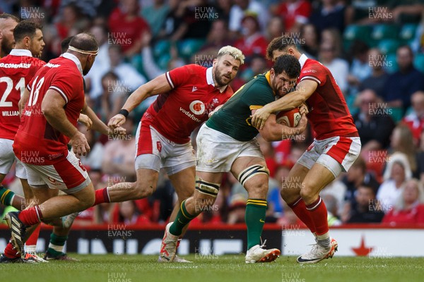 190823 - Wales v South Africa - Summer Series - Marco van Staden of South Africa is tackled by Tom Rogers of Wales