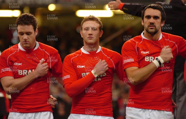 24.11.07 - Wales v South Africa - The Prince William Cup - Wales'(l-r) Mark Jones, Morgan Stoddart and Jonathan Thomas line up for national anthems 