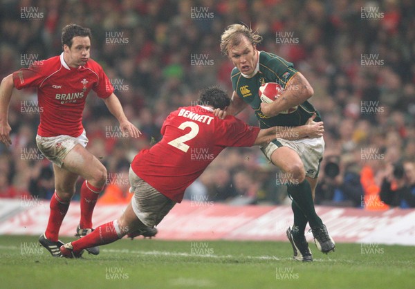 24.11.07 - Wales v South Africa, Prince William Cup. - South Africa's Schalk Burger is held by Wales' Huw Bennett Huw Evans Agency, Cardiff