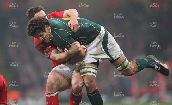 24.11.07 - Wales v South Africa, Prince William Cup. - South Africa's Ryan Kankowski is tackled by Wales' Mark Jones Huw Evans Agency, Cardiff