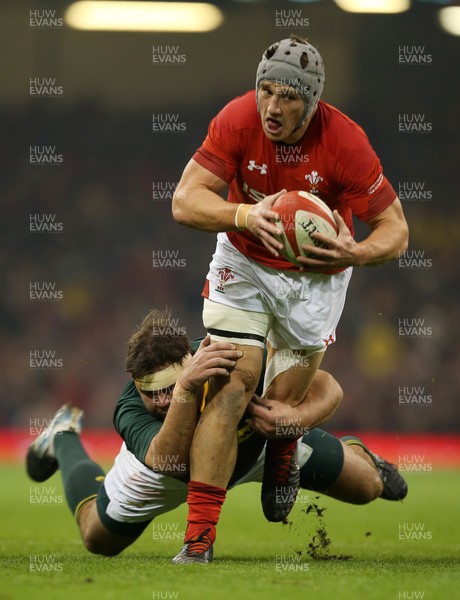 241118 - Wales v South Africa - Under Armour Series - Jonathan Davies of Wales is tackled by Frans Malherbe of South Africa