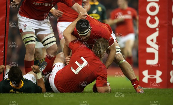 241118 - Wales v South Africa - Under Armour Series - Tomas Francis of Wales celebrates scoring a try with team mates