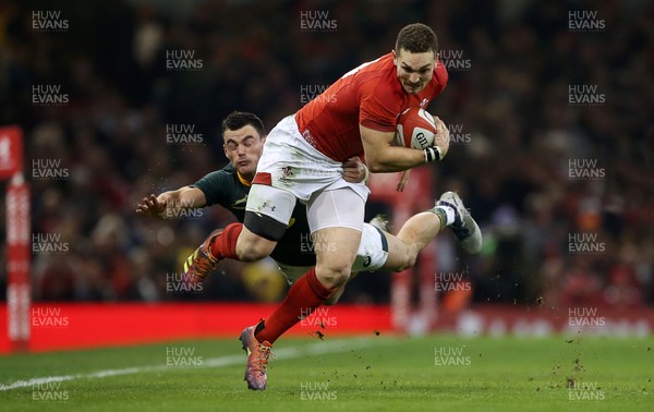 241118 - Wales v South Africa - Under Armour Series - George North of Wales is tackled by Jesse Kriel of South Africa