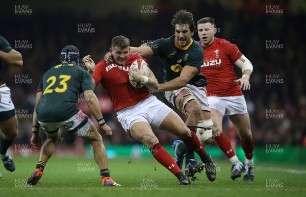 241118 - Wales v South Africa - Under Armour Series - Elliot Dee of Wales is tackled by Eben Etzebeth of South Africa