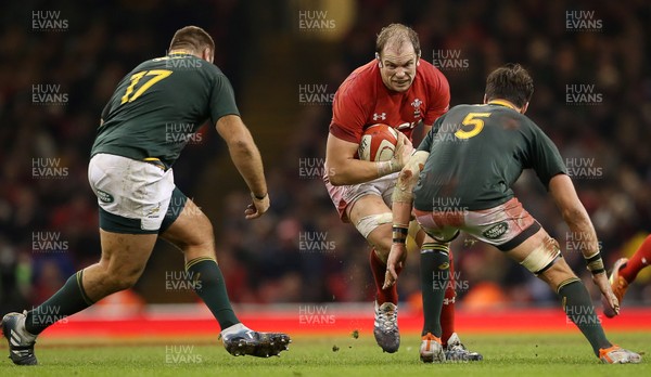 241118 - Wales v South Africa - Under Armour Series - Alun Wyn Jones of Wales is tackled by Franco Mostert of South Africa
