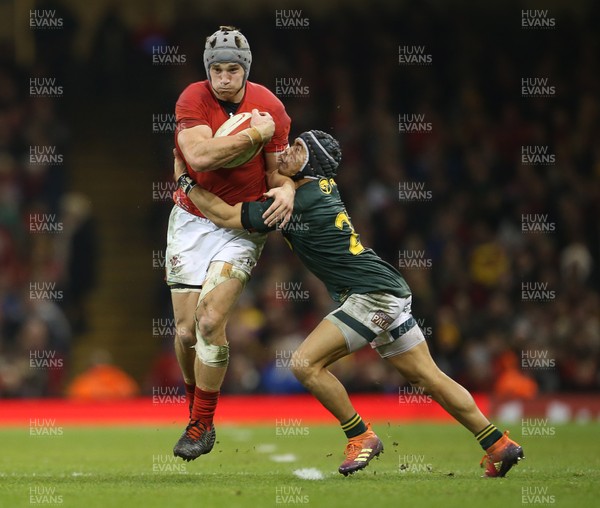 241118 - Wales v South Africa - Under Armour Series - Jonathan Davies of Wales is tackled by Cheslin Kolbe of South Africa