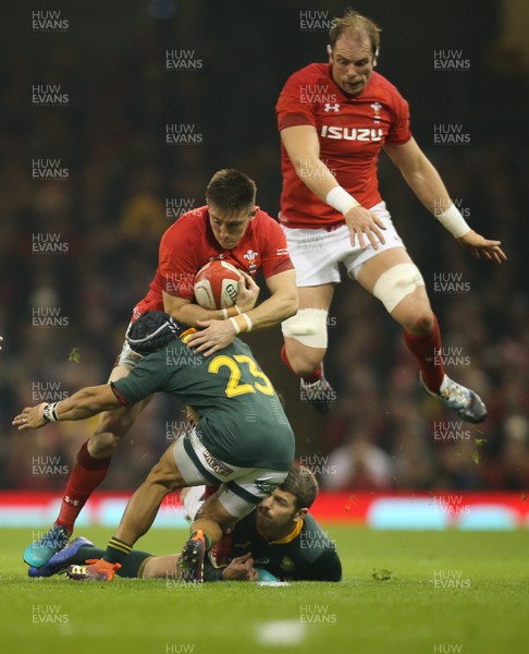 241118 - Wales v South Africa, Under Armour Series 2018 - Josh Adams of Wales is tackled by Damian Willemse of South Africa as Alun Wyn Jones of Wales takes avoiding action