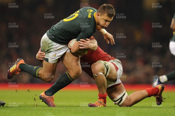 241118 - Wales v South Africa - Under Armour Series -  Handr� Pollard of South Africa is tackled by Ellis Jenkins of Wales 