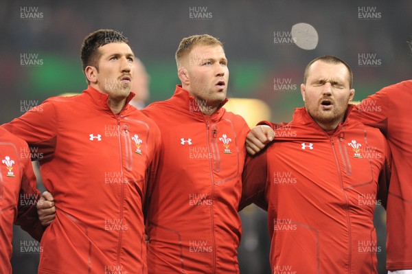 241118 - Wales v South Africa - Under Armour Series - Justin Tipuric of Wales Ross Moriarty of Wales and Ken Owens of Wales sing the anthem