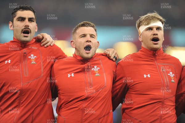 241118 - Wales v South Africa - Under Armour Series - Cory Hill of Wales Elliot Dee of Wales and Aaron Wainwright of Wales sing the anthem