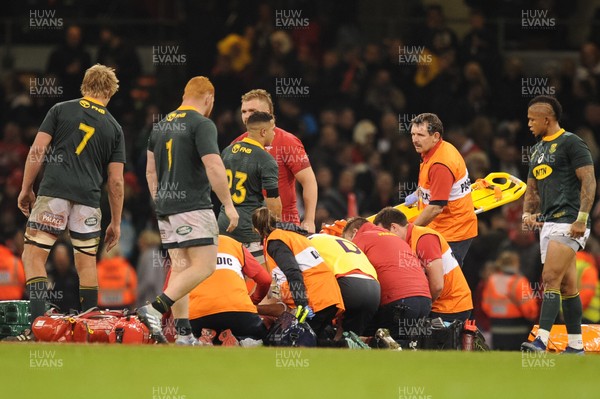 241118 - Wales v South Africa - Under Armour Series - South Africa players go to see the injured Ellis Jenkins of Wales 