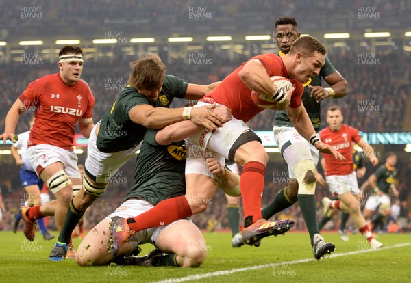 241118 - Wales v South Africa - Under Armour Series -  George North of Wales is tackled by Eben Etzebeth and Steven Kitshoff of South Africa