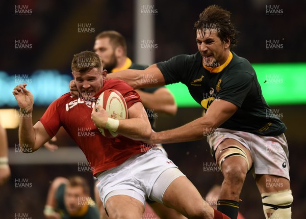 241118 - Wales v South Africa - Under Armour Series -  Elliot Dee of Wales is tackled by Eben Etzebeth of South Africa 