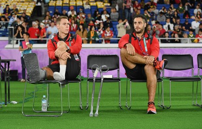 271019 - Wales v South Africa - Rugby World Cup Semi-Final - Liam Williams and Josh Navidi sit on the bench injured