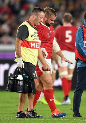 271019 - Wales v South Africa - Rugby World Cup Semi-Final - Tomas Francis of Wales goes off the field injured