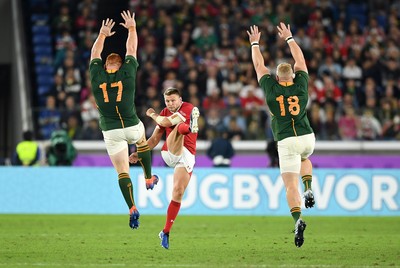 271019 - Wales v South Africa - Rugby World Cup Semi-Final - Dan Biggar of Wales kicks the ball high