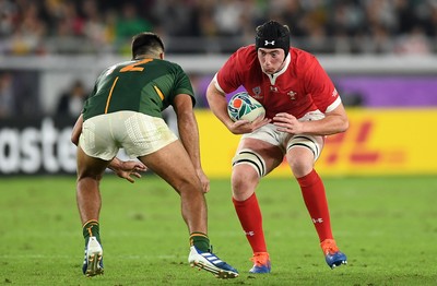 271019 - Wales v South Africa - Rugby World Cup Semi-Final - Adam Beard of Wales is tackled by Damian de Allende of South Africa