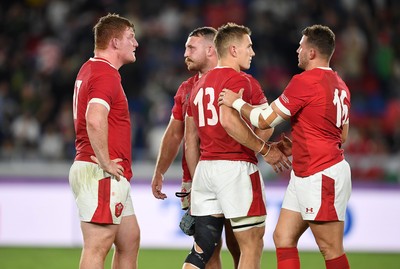 271019 - Wales v South Africa - Rugby World Cup Semi-Final - Dejected Rhys Carre, Dillon Lewis, Jonathan Davies and Elliot Dee of Wales