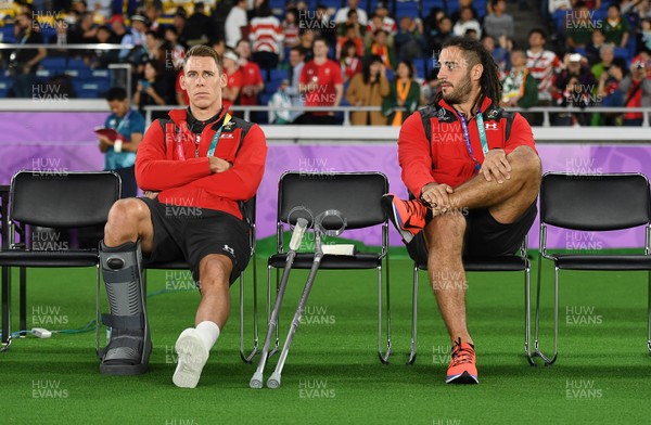 271019 - Wales v South Africa - Rugby World Cup Semi-Final - Liam Williams and Josh Navidi sit on the bench injured