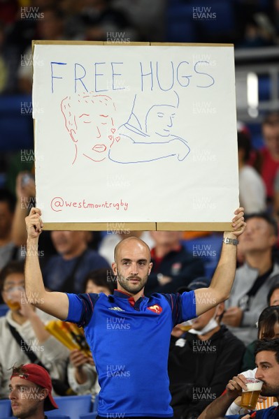 271019 - Wales v South Africa - Rugby World Cup Semi-Final - A French fan holds up a free hugs sign