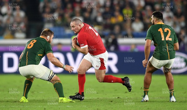 271019 - Wales v South Africa - Rugby World Cup Semi-Final - Ken Owens of Wales is tackled by Duane Vermeulen of South Africa