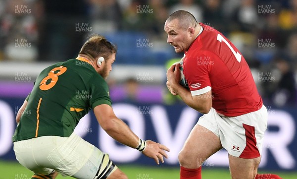 271019 - Wales v South Africa - Rugby World Cup Semi-Final - Ken Owens of Wales is tackled by Duane Vermeulen of South Africa