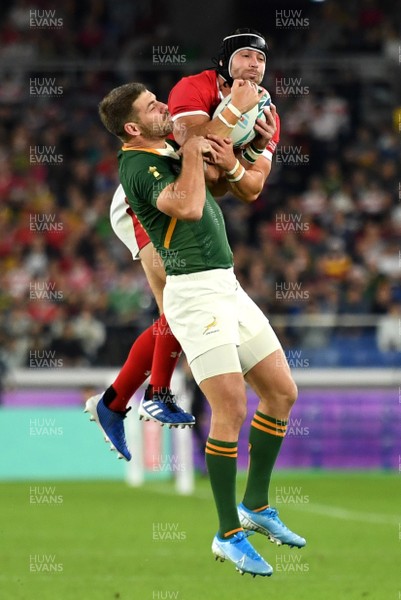 271019 - Wales v South Africa - Rugby World Cup Semi-Final - Leigh Halfpenny of Wales gets the high ball from Willie le Roux of South Africa