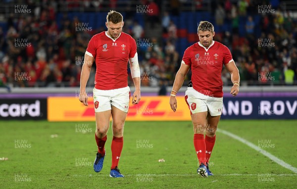 271019 - Wales v South Africa - Rugby World Cup Semi-Final - Dejected Dan Biggar and Leigh Halfpenny of Wales
