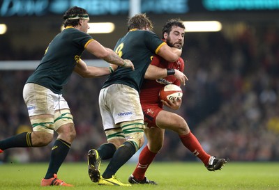 291114 - Wales v South Africa - Dove Men Series -Scott Baldwin of Wales is tackled by Duane Vermeulen of South Africa