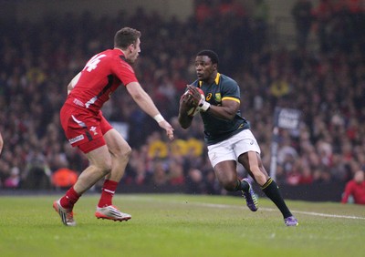 291114 - Wales v South Africa - Dove Men+Care Series -Lwazi Mvovo of South Africa takes on Alex Cuthbert of Wales