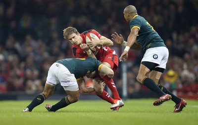 291114 - Wales v South Africa, Dove Men Series 2014, Cardiff - Liam Williams of Wales is tackled by Pat Lambie of South Africa 