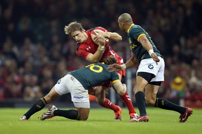 291114 - Wales v South Africa, Dove Men Series 2014, Cardiff - Liam Williams of Wales is tackled by Pat Lambie of South Africa 